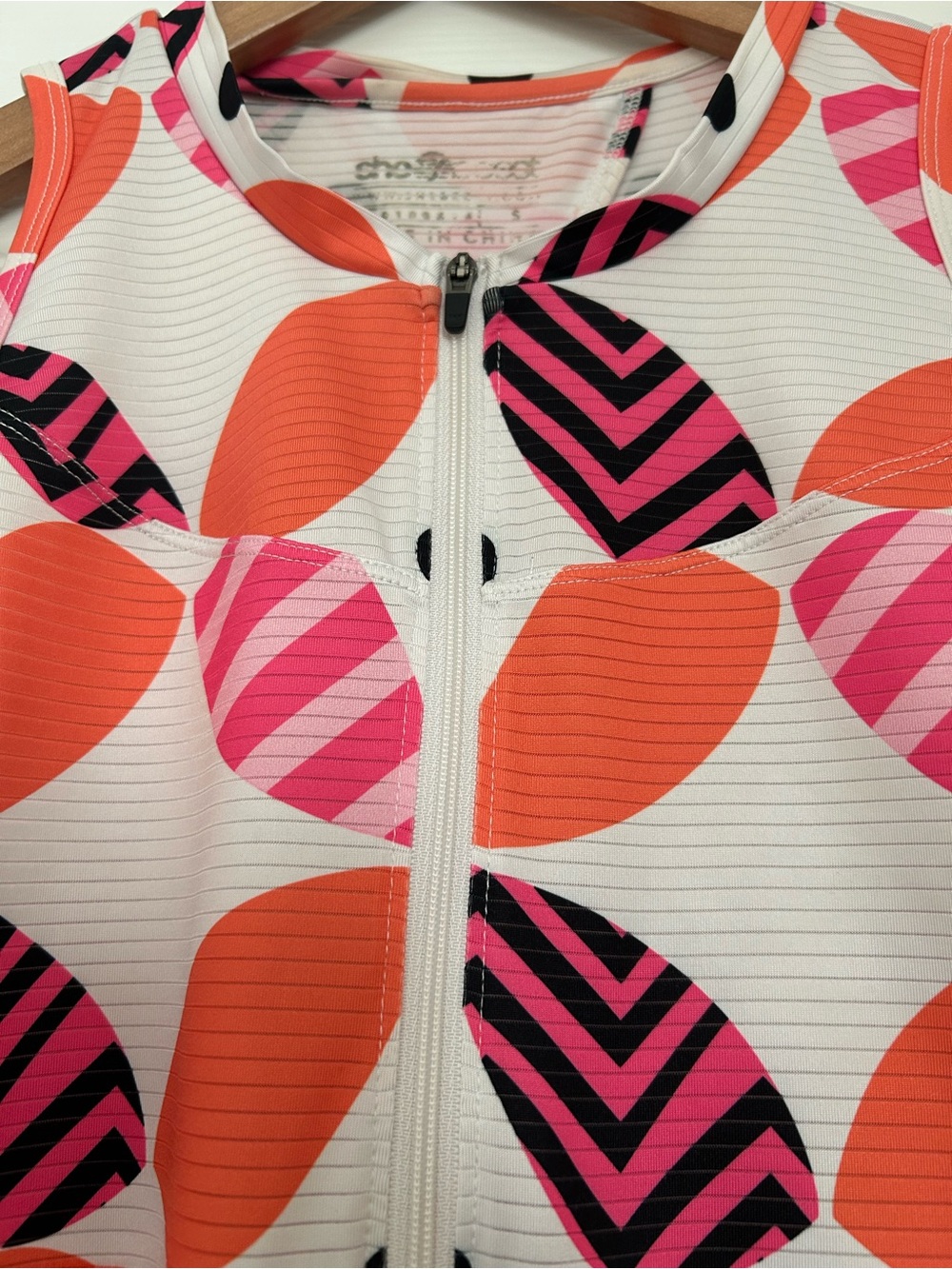 shebeest Sleeveless Zip Tank in Orange, Pink & Black Leaf Pattern - Picture 6 of 6